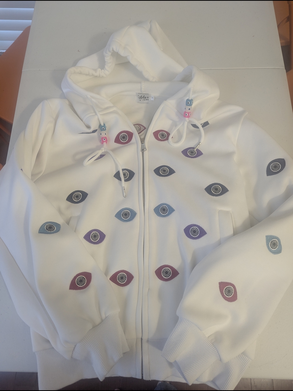 Lola + The Boys White Hoodie with Pink and Purple Eye Embroidery